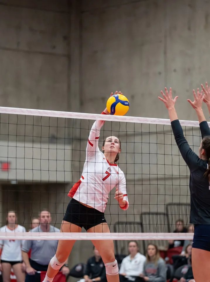 Ohio State women's volleyball player spiking the ball