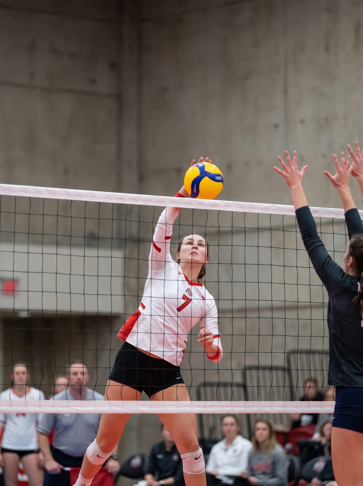 Ohio State women's volleyball player spiking the ball